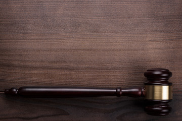 judge gavel on the brown wooden background