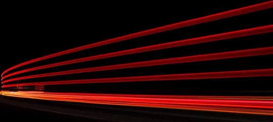 Cercles muraux Autoroute dans la nuit Abstract orange, red and yellow lights in road tunnel