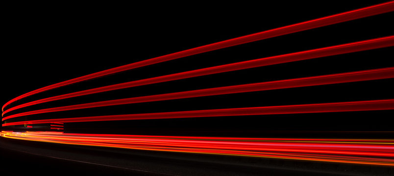 Abstract orange, red and yellow lights in road tunnel