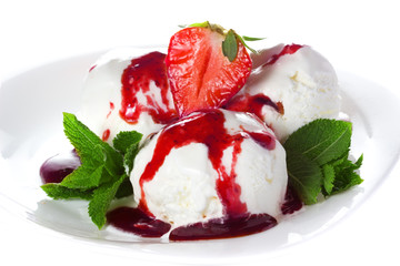 Vanilla ice cream with strawberry mint and berry sauce, syrup