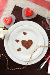 Table setting in honor of Valentine's Day close-up