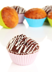 Sweet cupcakes on white table