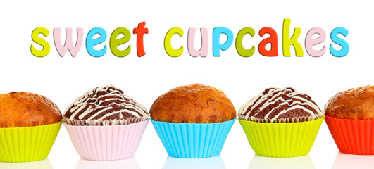 Sweet cupcakes isolated on white