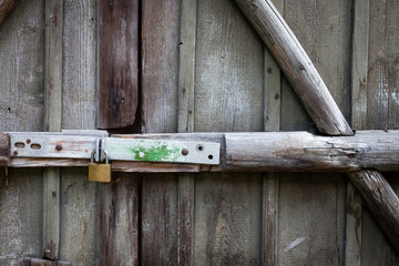 Old wooden door with lock