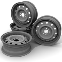 Автомобильные штампованные диски на белом фоне