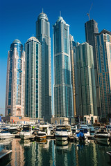 Fototapeta na wymiar High rise buildings and streets in Dubai, UAE