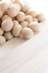 close up of soy bean in wooden cup Masu 