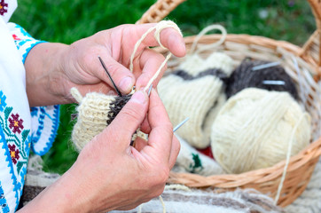 Romanian woman Handmade crocheting  with needles