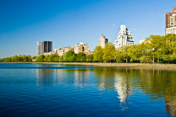 Central Park Lake, with manhattan skyscrapers New York City, USA