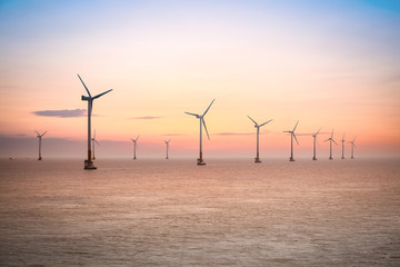 offshore wind farm in sunset