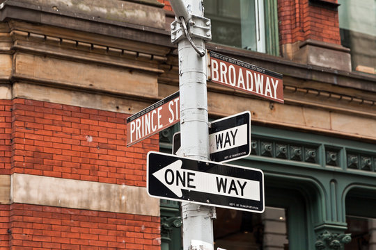 Fototapeta Street signs and traffic lights in New York, USA