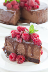 Chocolate cheesecake with raspberries.