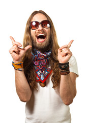 Fun portrait of a surprised hippy man pointing up at copyspace.