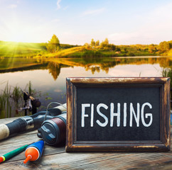 fishing tackle and a blackboard