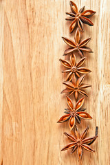 Asterisks anise on a wooden board
