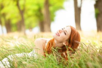 Redhead girl at outdoor