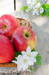 Fresh red apples in a basket