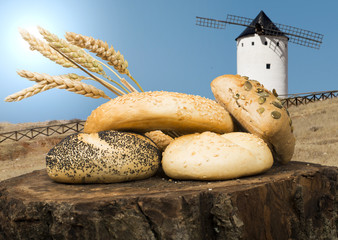 Different breads and windmill in the background