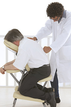 Amma assis - Massage colonne vertébrale