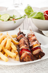 Grilled shashlik with french fries