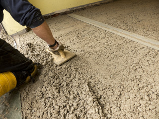 Baustellen Bauarbeiten Zement glätten