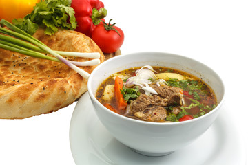 Kharcho soup with bread and vegetables