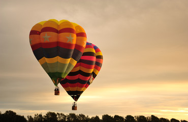 Hot air balloons flying during festival.