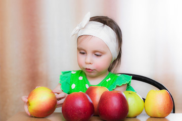 Happy Kid with apples.