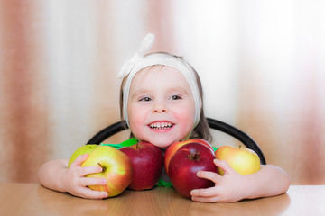Fototapeta premium Happy Kid with apples.