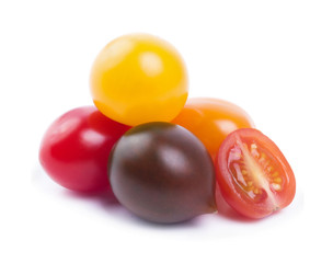 colored cherry tomatoes on a white background