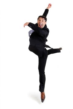 Agile Businessman Doing A Pirouette