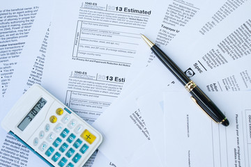 U.S.Tax form, pen and calculator