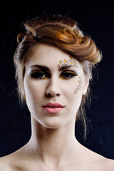 Fototapeta premium Beautiful Woman with Luxury Makeup