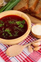 Delicious borsch on table close-up