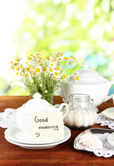 Table setting with chamomiles