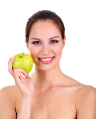 Smiling woman with apple isolated on white