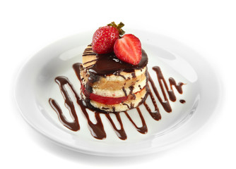 Tasty biscuit cake with chocolate and berries