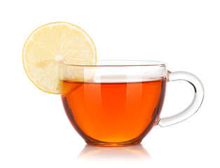 Glass cup of black tea with lemon slice