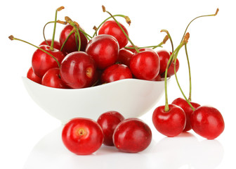 Cherry berries in bowl isolated on white