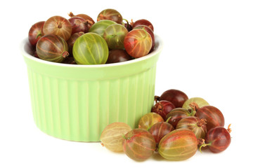 Fresh gooseberries in bowl isolated on white