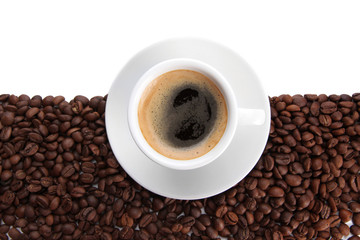 Cup of coffee with coffee beans, isolated on white