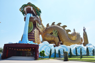 Fototapeta na wymiar Golden Dragon at Chinese Village Suphaburi Thailand