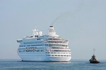 cruise ship and towboat