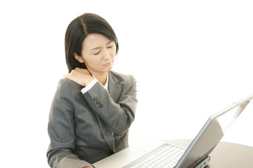 肩痛を訴える女性