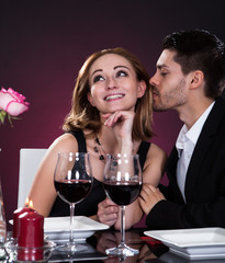 Happy couple in restaurant