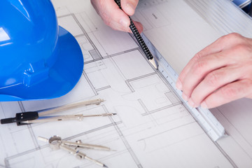 Mature Architect Male Working At The Desk