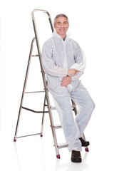 Mature Man Sitting On Ladder