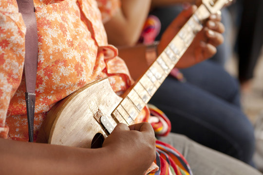 Thai Musician, A man playing northeastern Thailand lute