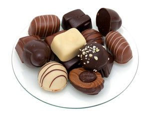 chocolate candies over white