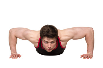 Fototapeta na wymiar Young man doing push up exercise